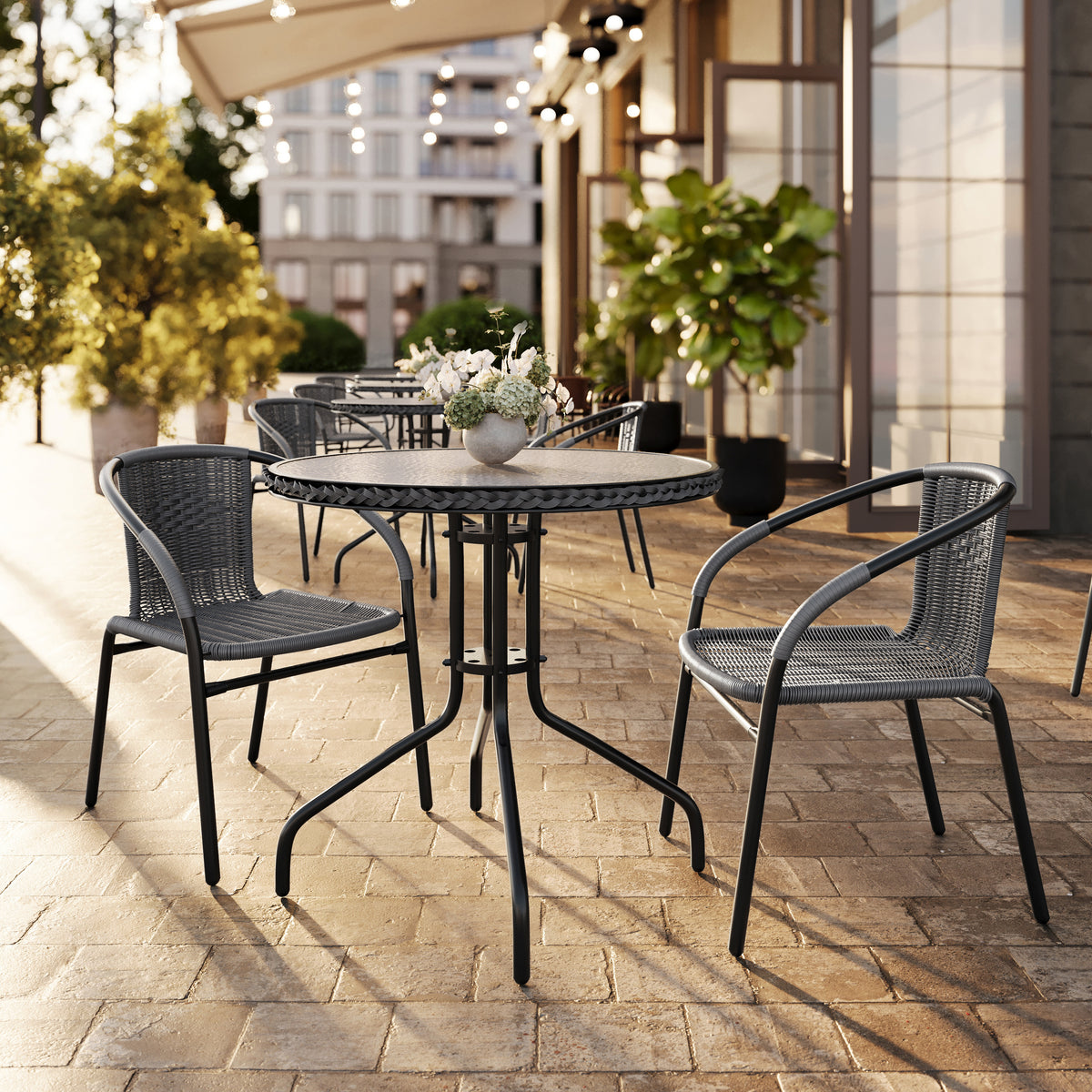 Barker 28'' Round Glass Metal Table with Rattan Edging and 2 Rattan Stack Chairs