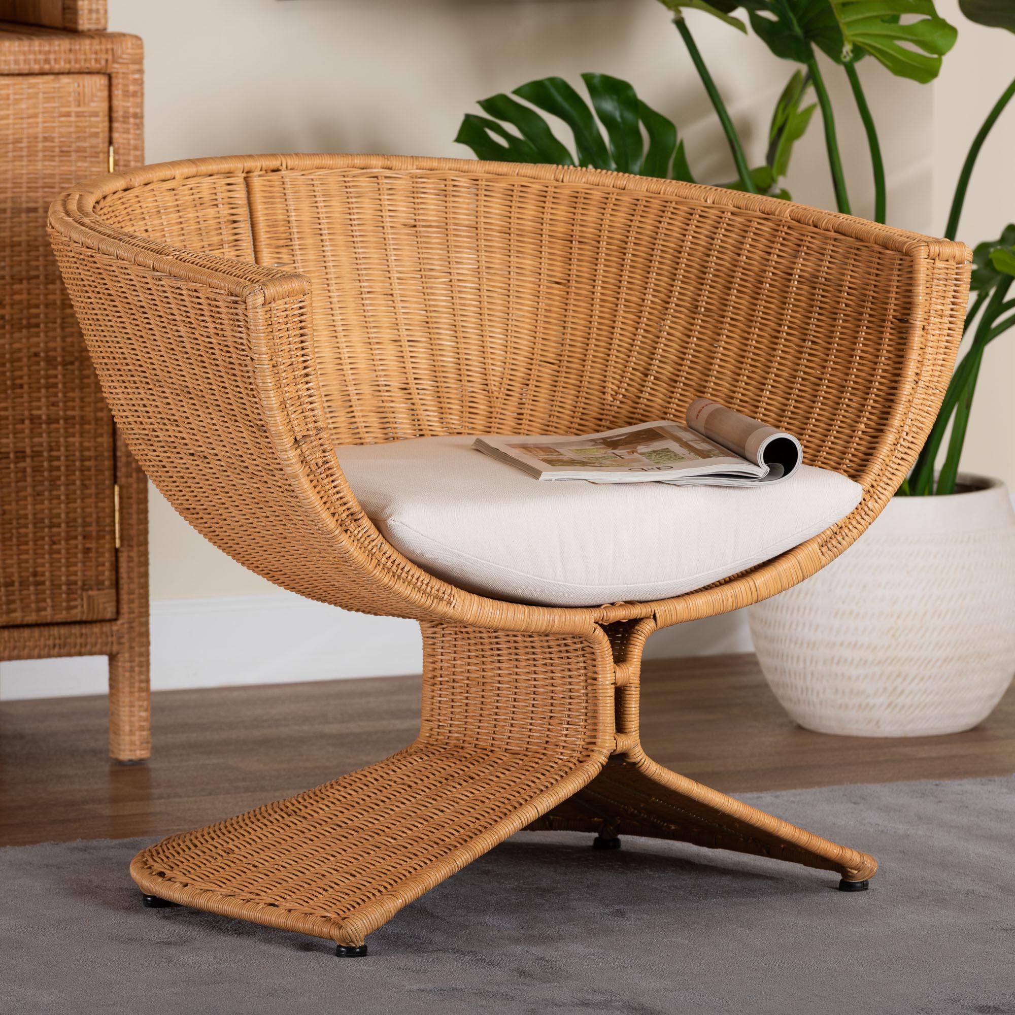 bali & pari Reya Rattan Lounge Chair - Handwoven Wicker Accent Seating with Pedestal Base for Modern Boho, Coastal, or Tropical Living Room Spaces