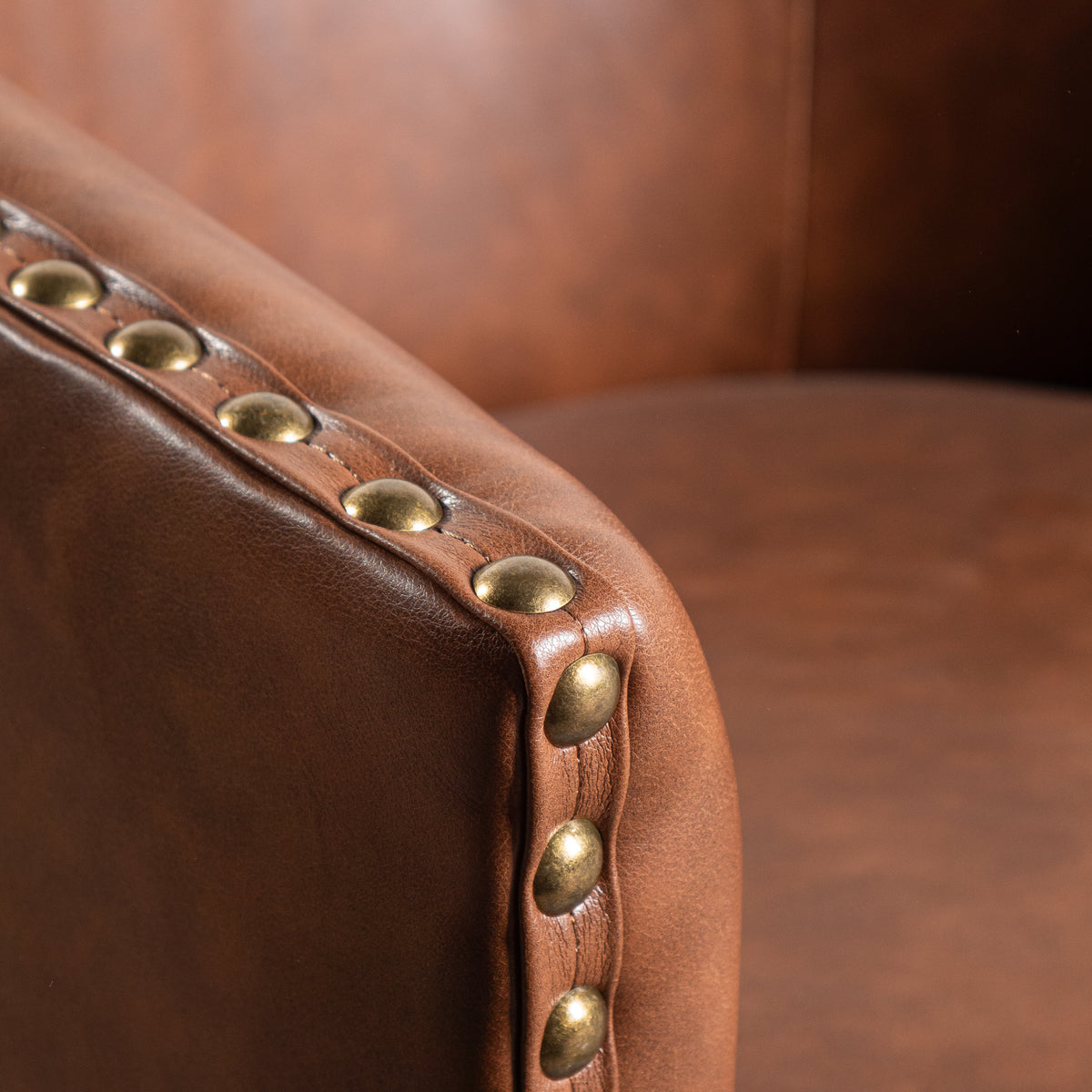Myles Club Style Commercial Barrel Accent Armchair with 360° Swivel Metal Base and Upholstery with Decorative Nail Head Trim