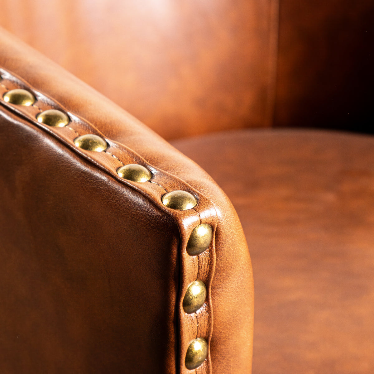 Myles Club Style Commercial Barrel Accent Armchair with 360° Swivel Metal Base and Upholstery with Decorative Nail Head Trim