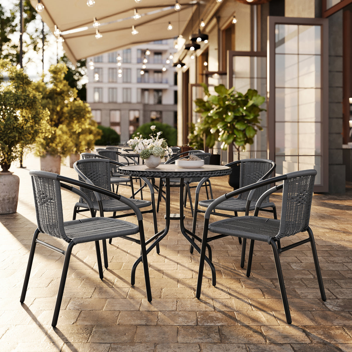 Barker 28'' Round Glass Metal Table with Rattan Edging and 4 Rattan Stack Chairs