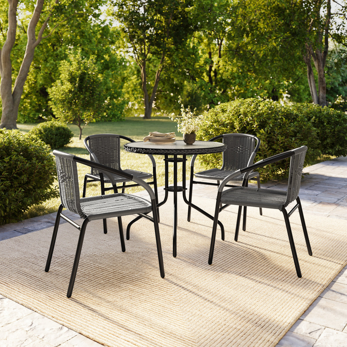 Barker 28'' Round Glass Metal Table with Rattan Edging and 4 Rattan Stack Chairs